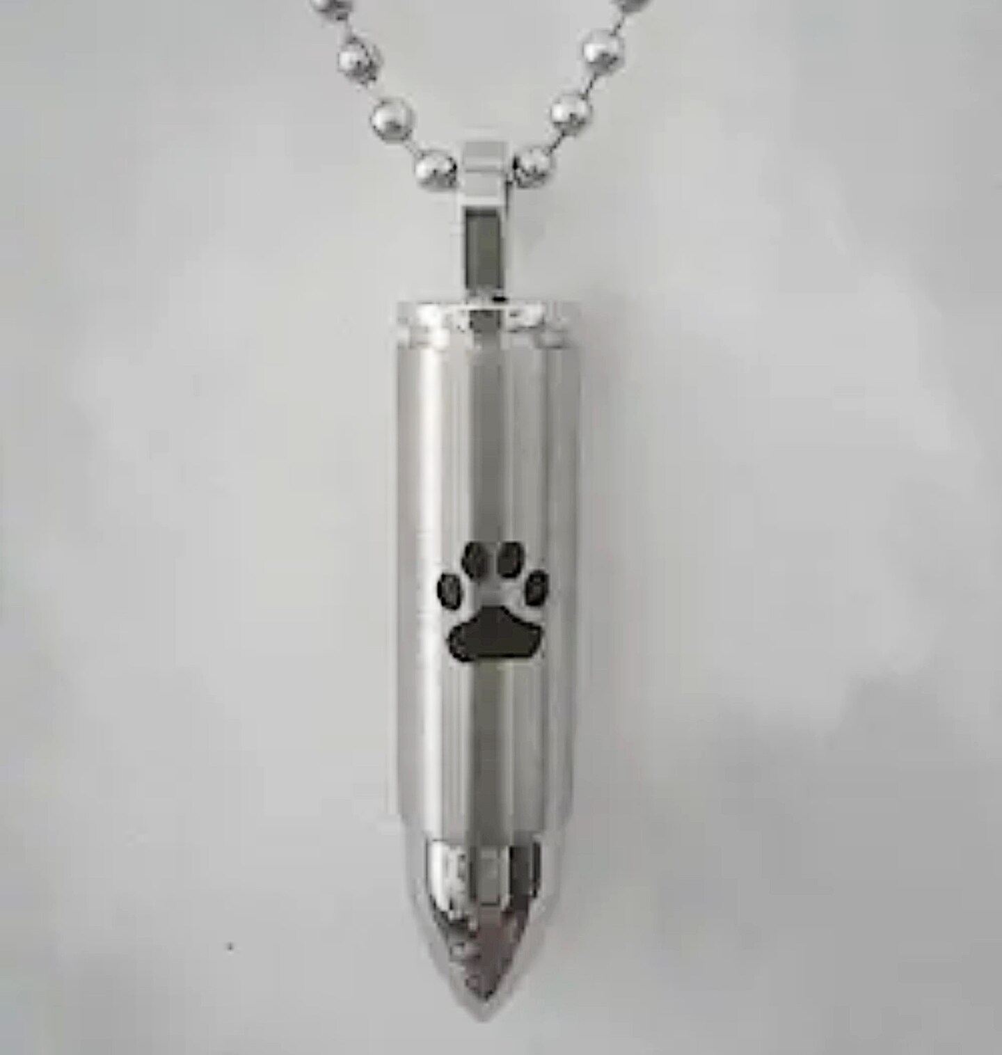 product name is Custom Engraved Stainless Steel BULLET CREMATION URN with PAW on 24" Ball-Chain Necklace - Pet Loss, Pet Memorial
