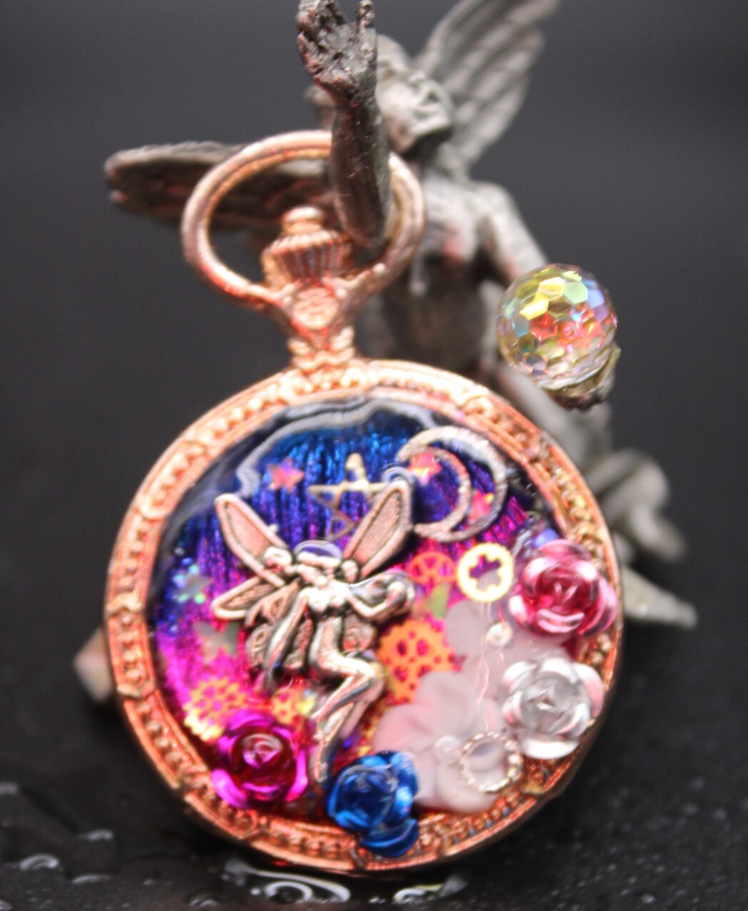 Dancing under the moon in the flower beds of the fairies good luck charm resin ornament pendant. MakerPlace by Michaels