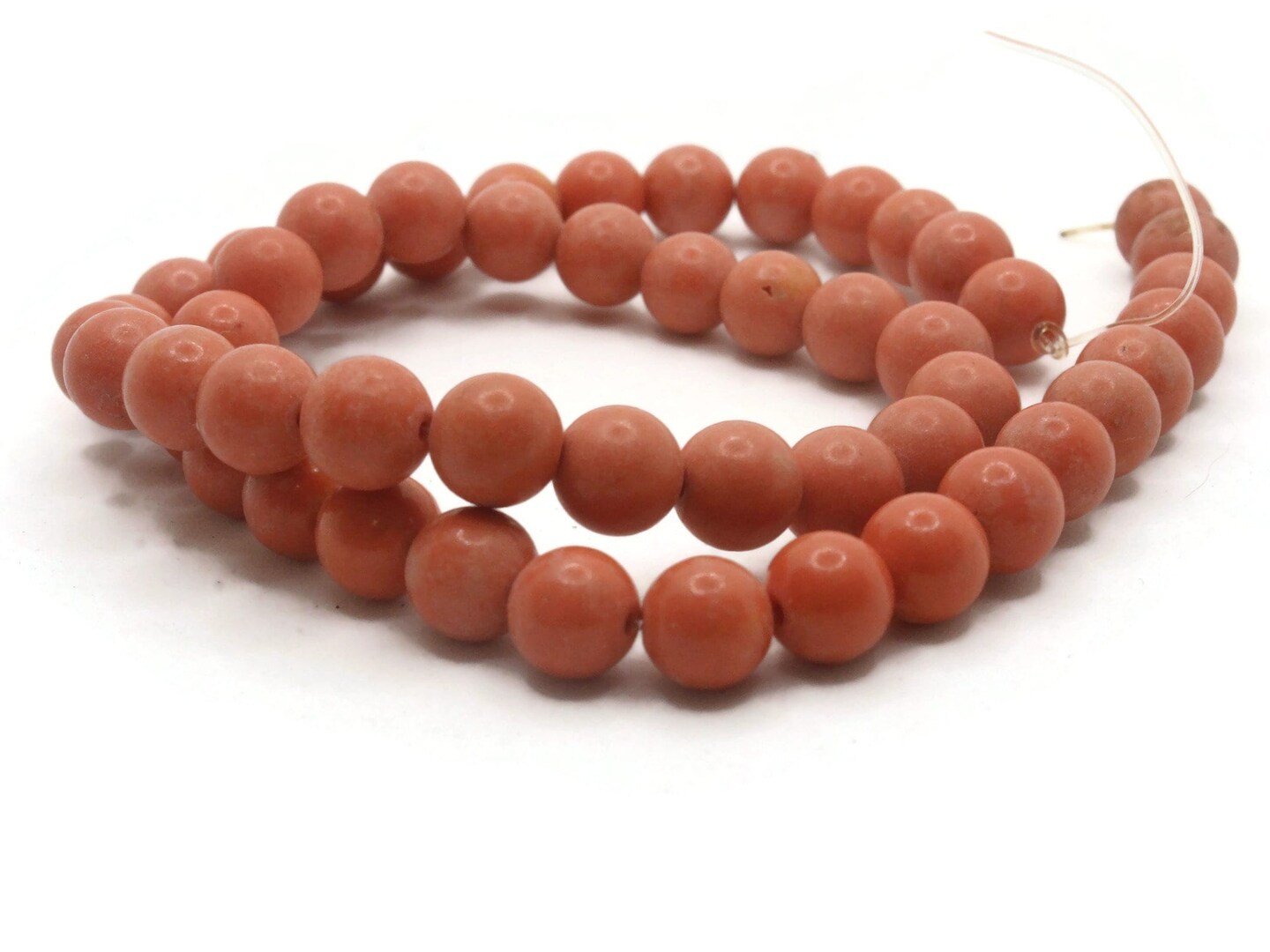 51 7mm to 8mm Round Dyed Orange Howlite Stone Beads