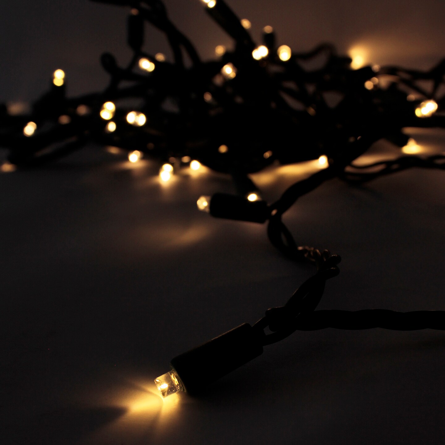 Perfect Holiday 70 LED Indoor/Outdoor Wide Angle 5MM LED Green Cable Christmas String Lights