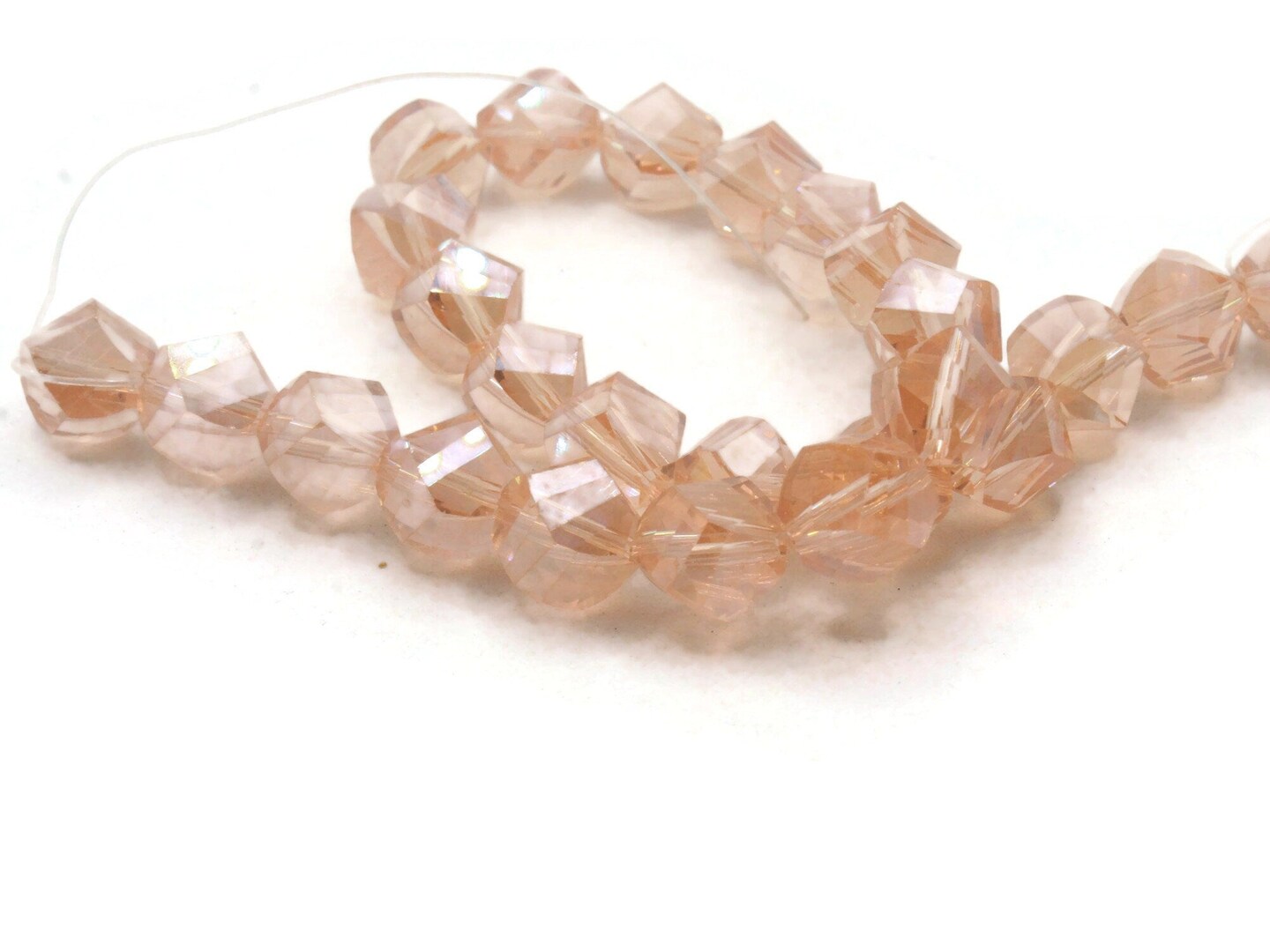 25 10mm Clear Pink Glass Twisting Faceted Beads