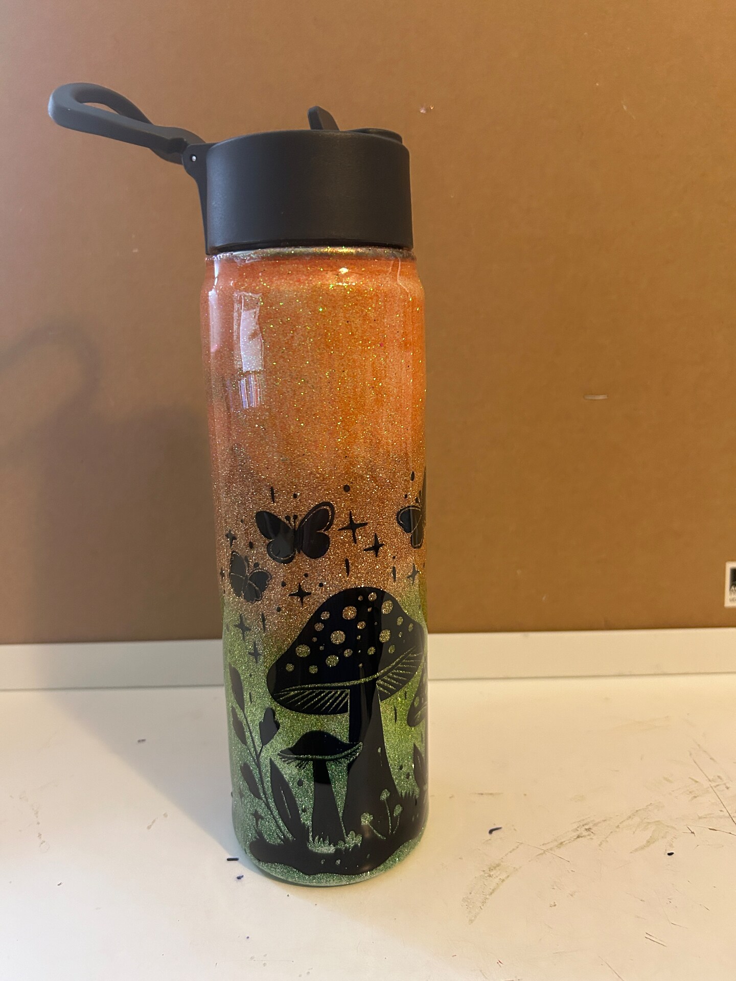 product name is Glitter and resin water bottle
