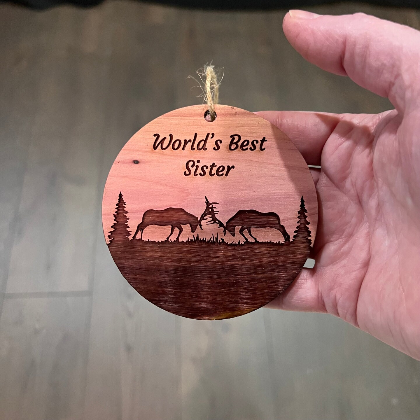 Worlds Best Sister Elk Battle - Cedar Ornament Worlds Best Sister Elk Battle - Cedar Ornament