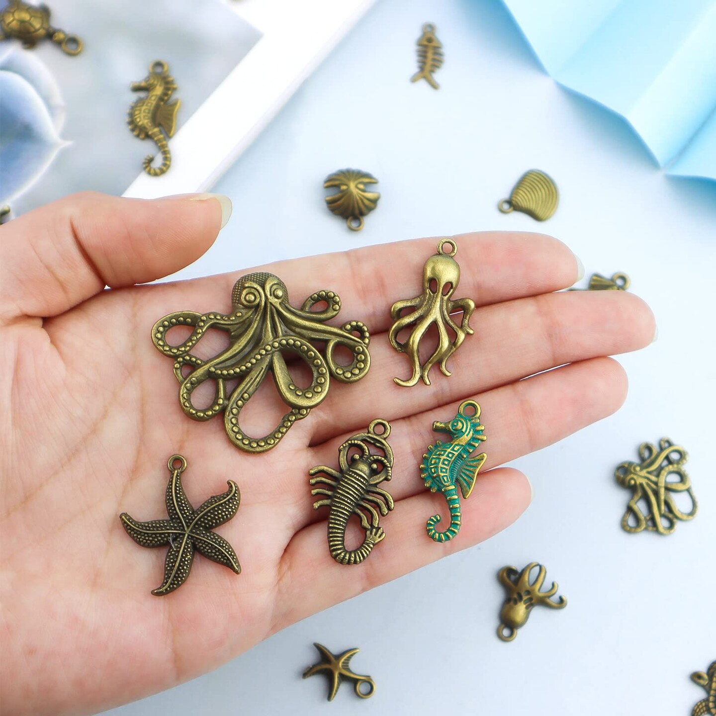 60 Pieces 100 Gram Assorted Antique Ocean Themed Charms Bronze Ocean Fish Sea Creatures Beads Pendants for Jewelry Making and Craft Making