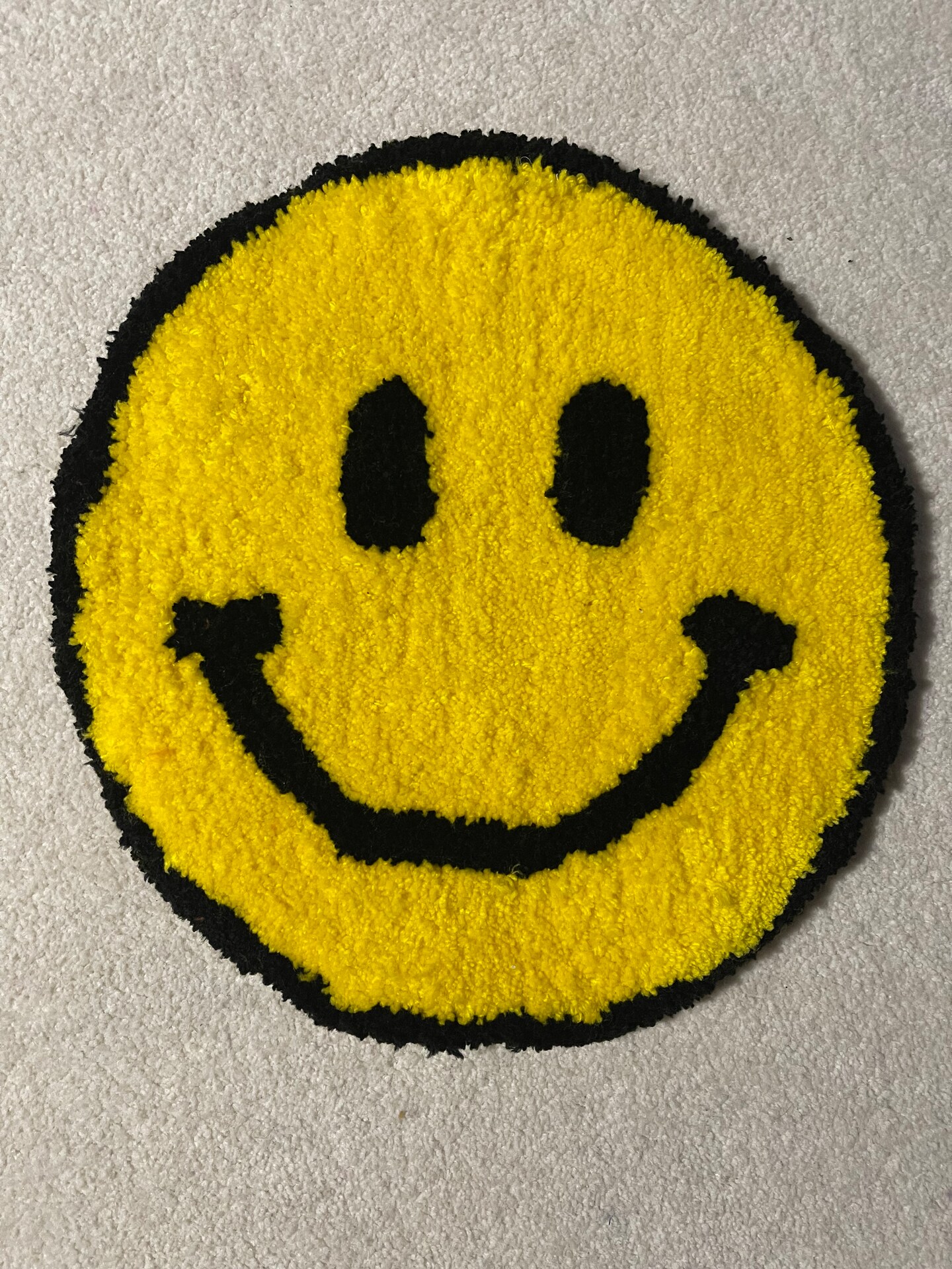 Smiley face rug with non slip back | MakerPlace by Michaels