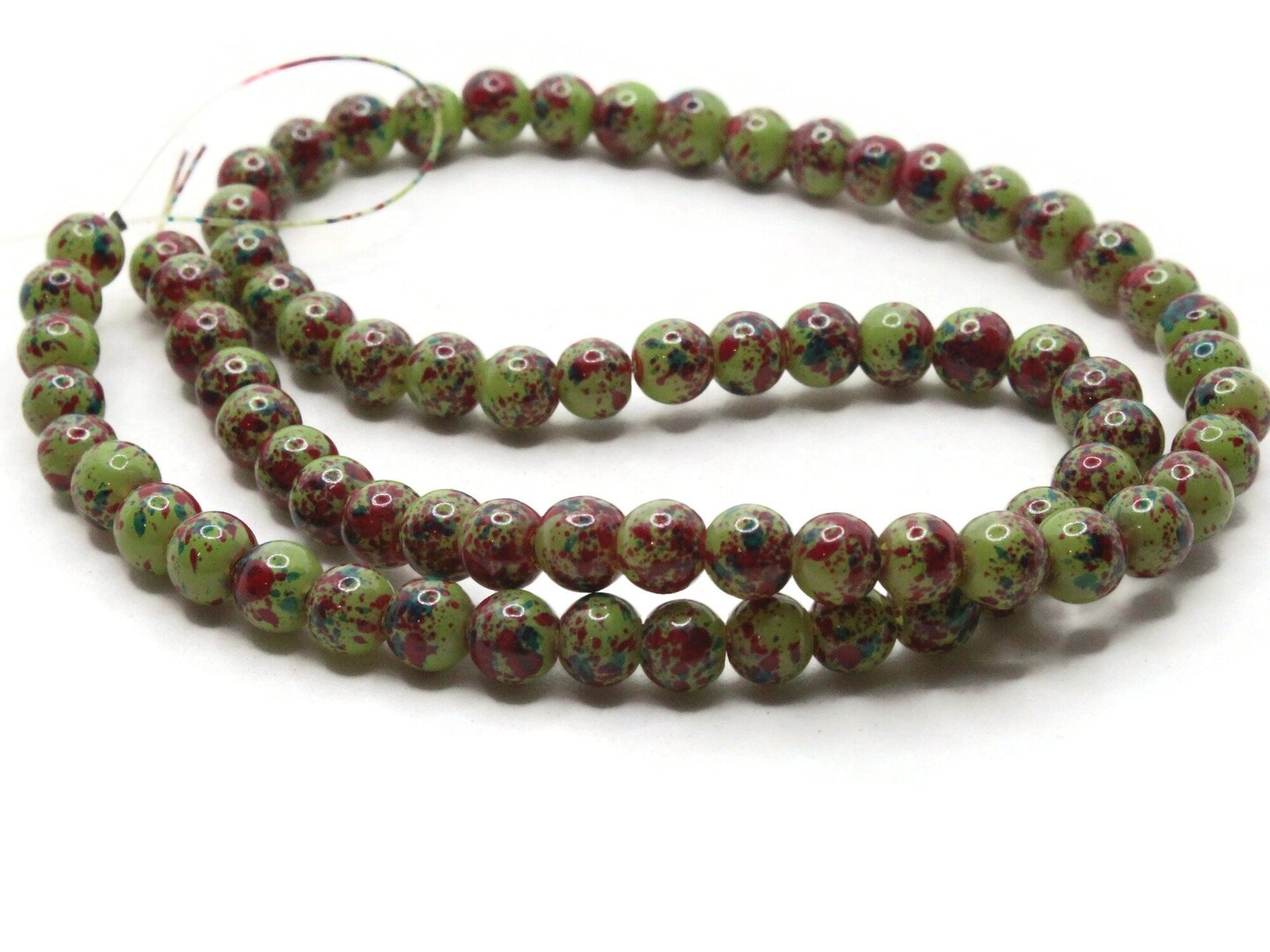 75 6mm Green and Red Splatter Paint Smooth Round Glass Beads