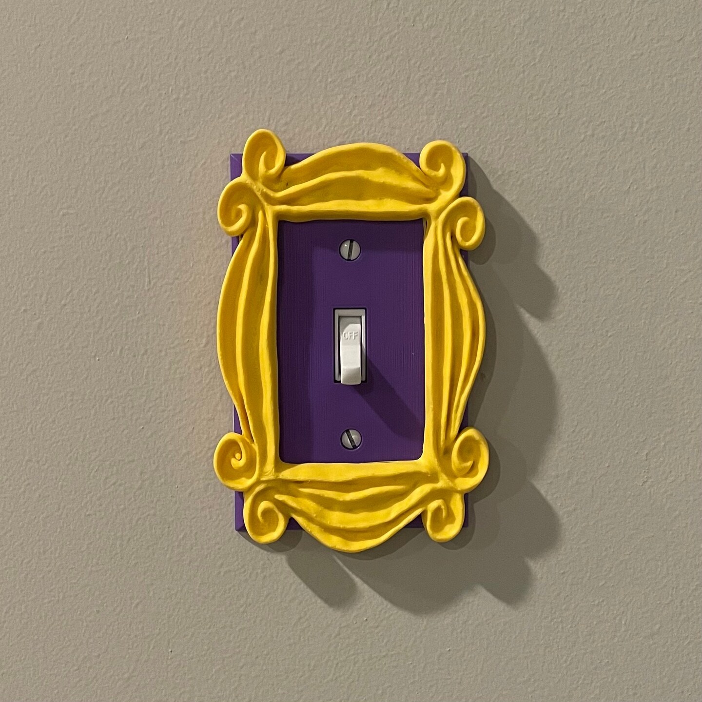 Friends' Inspired Peephole Frame Light Switch Cover - Monica's