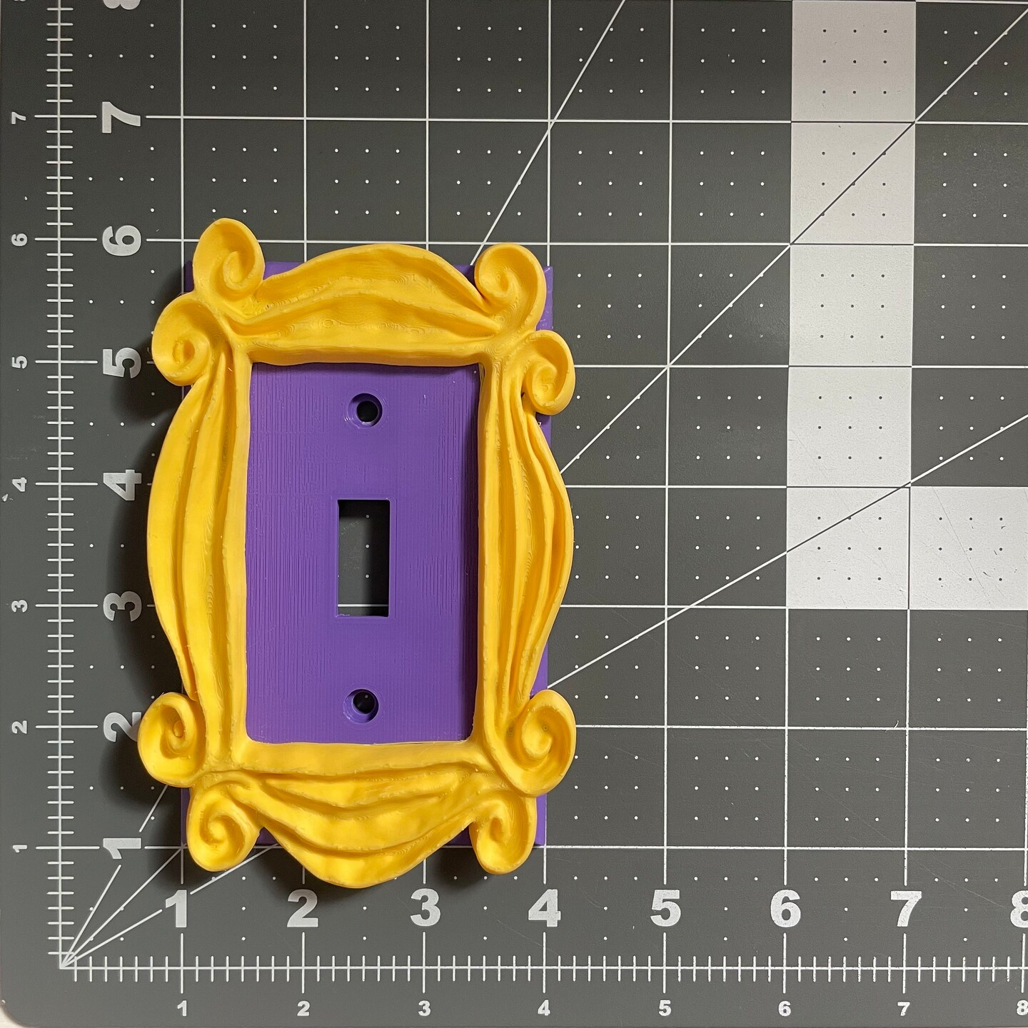 Friends' Inspired Peephole Frame Light Switch Cover - Monica's