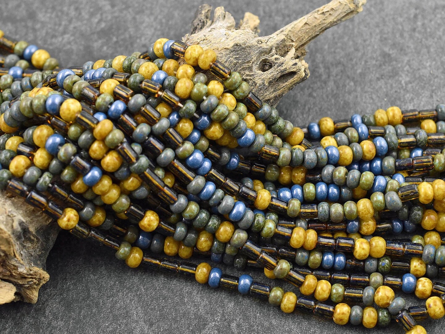 4/0 Aged Winterfell Striped Picasso Seed Bead Tube Mix (19" Strand)