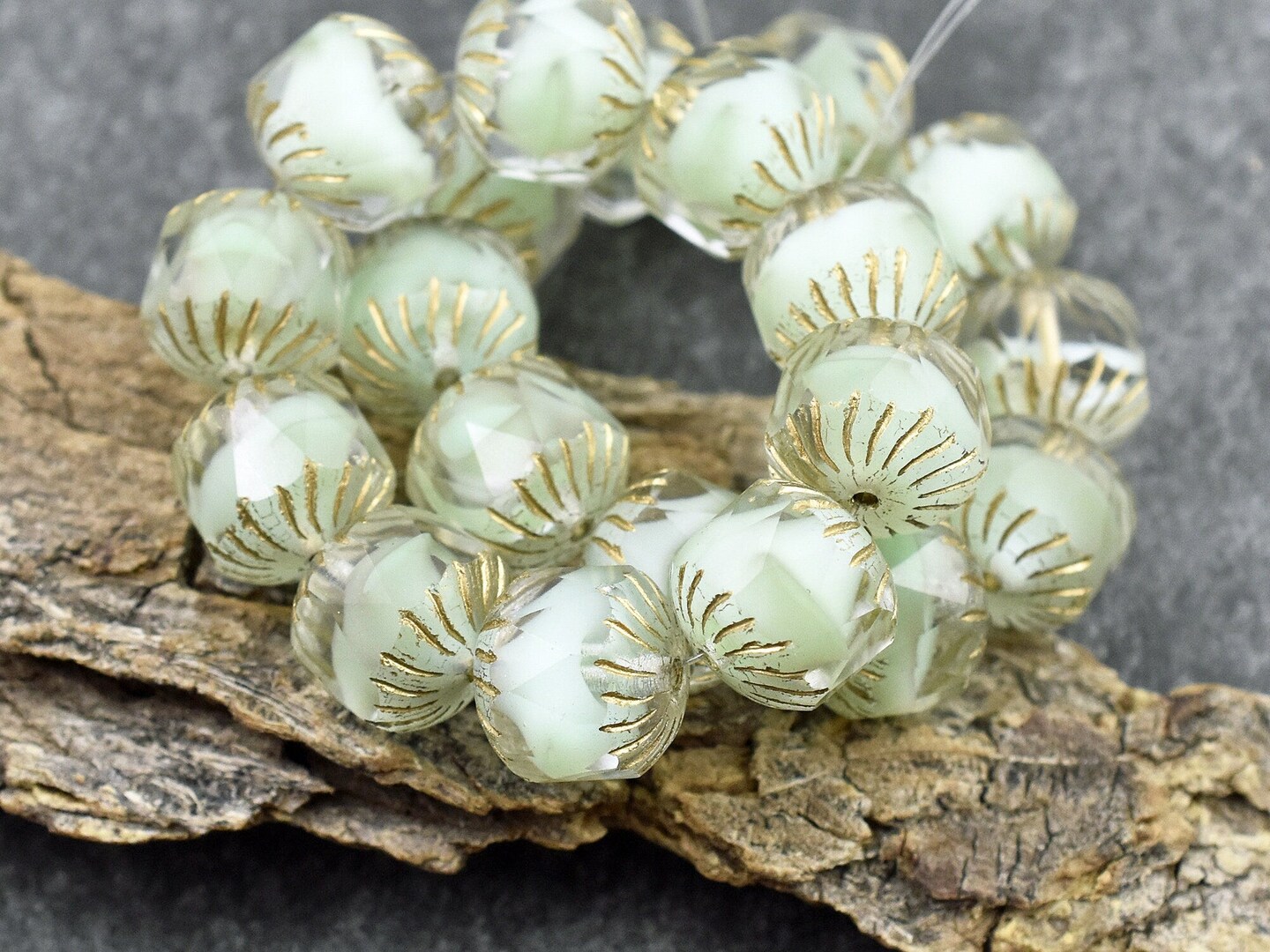 *10* 10mm Gold Washed Seafoam Crystal Silk (Vaseline Glass) Center Cut Cruller Beads