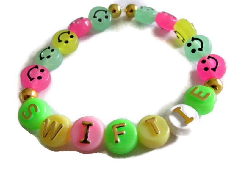 Smiley Face Clay Bead Bracelet -  Canada  Clay beads, Beaded  bracelets, Yellow bracelet