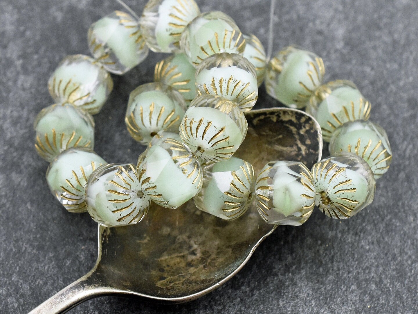 *10* 10mm Gold Washed Seafoam Crystal Silk (Vaseline Glass) Center Cut Cruller Beads