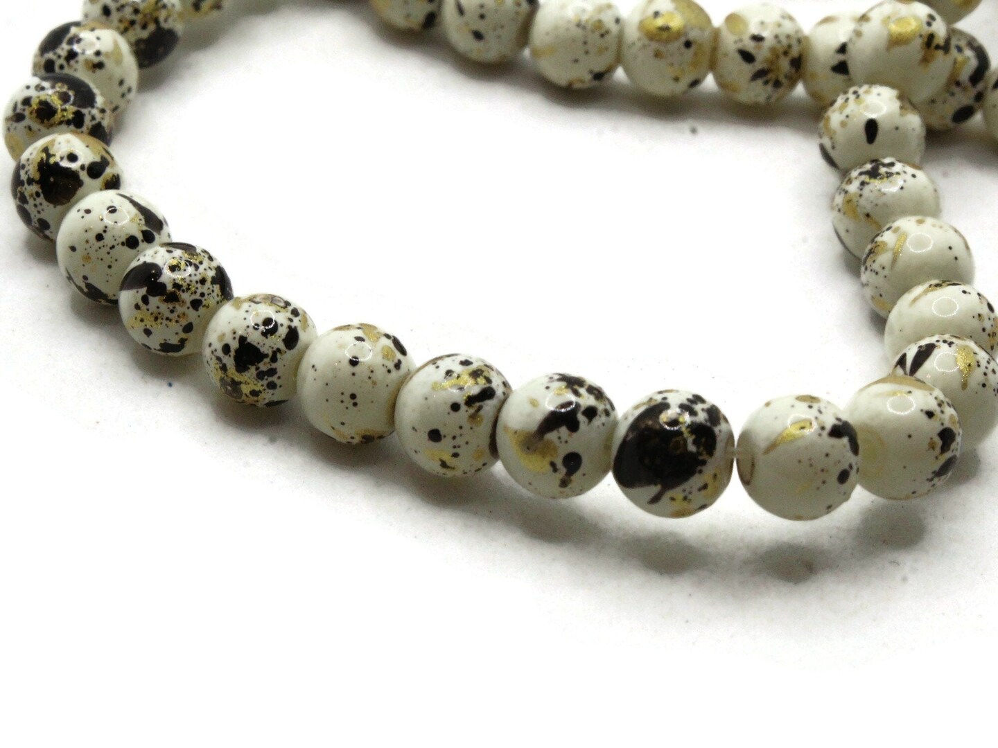 68 6mm Ivory, Gold and Black Splatter Paint Smooth Round Glass Beads