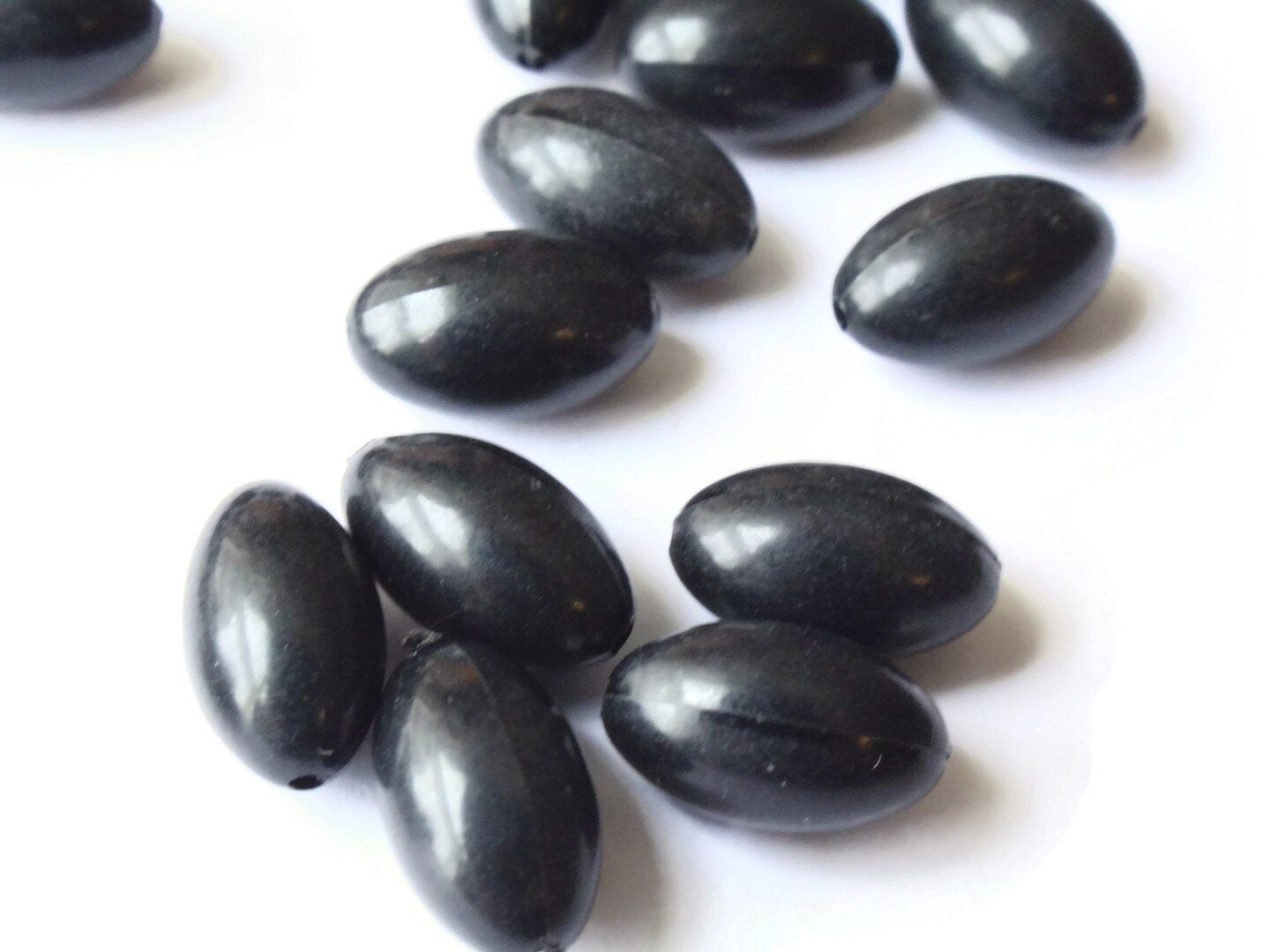 50 12mm x 7mm Smooth Oval Black Plastic Beads