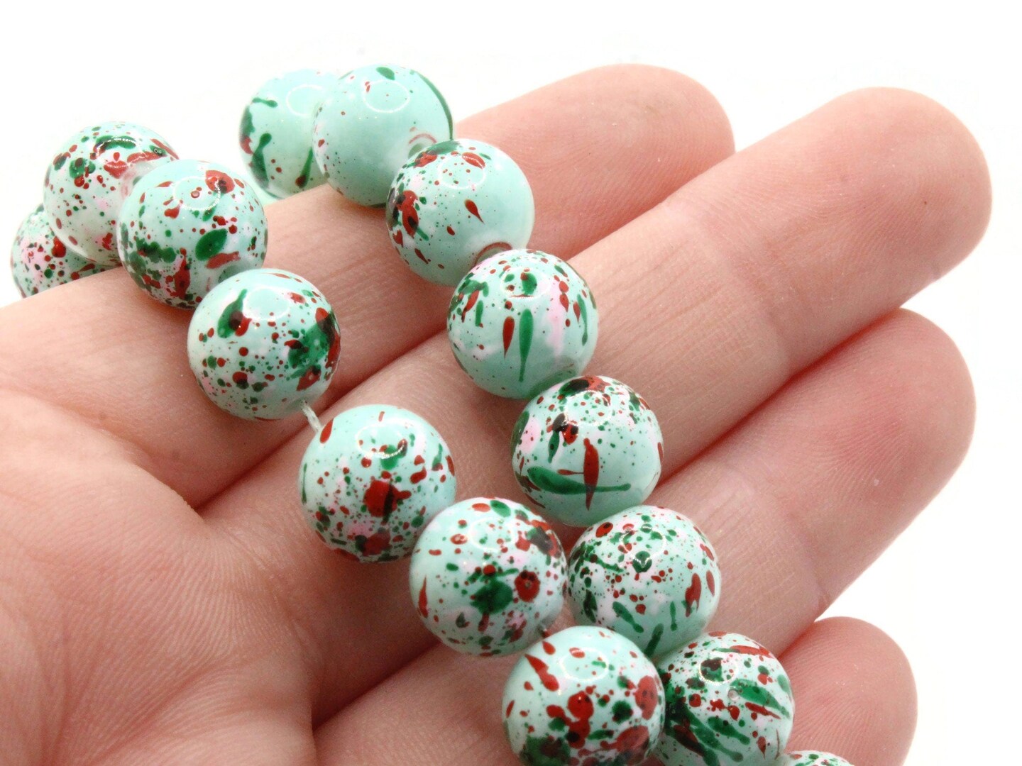 40 10mm Mint Green with Red &#x26; Pink Splatter Paint Smooth Round Glass Beads