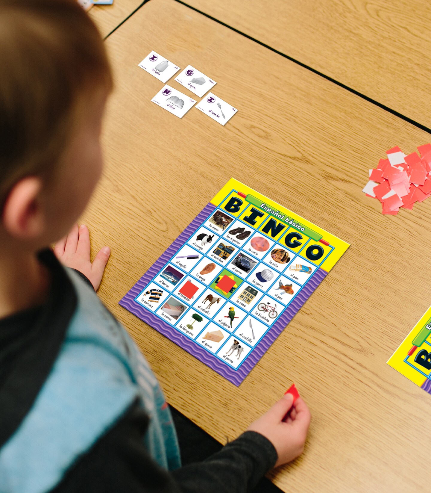 Carson Dellosa Basic Spanish Bingo Game—Learning Board Game With 50 Spanish Words With Photos, 36 Game Boards and Bingo Chips for 3-36 Players, Ages 4 and Up