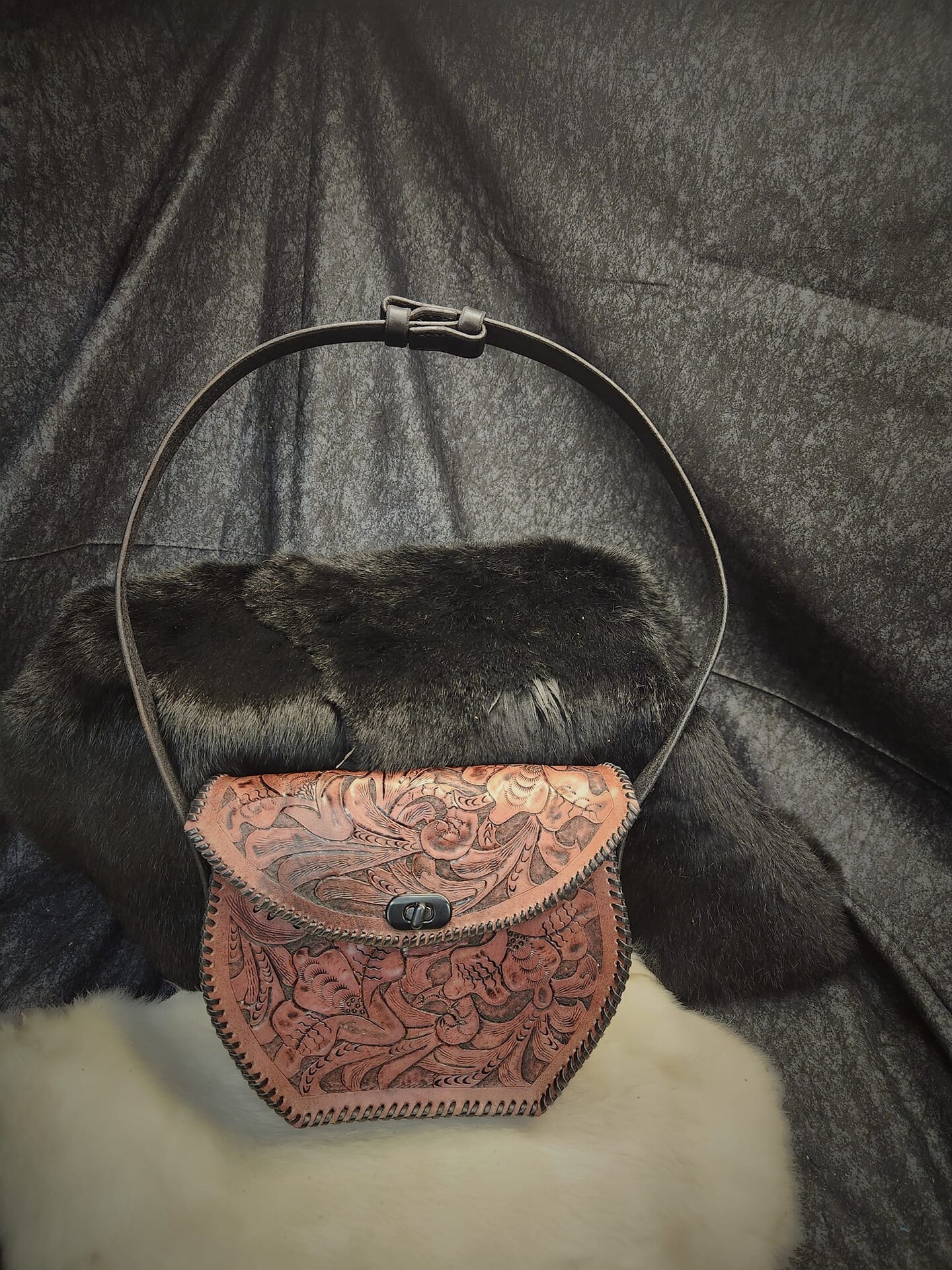 HAND TOOLED HAND LACED PURSE WITH ADJUSTABLE SLIDE