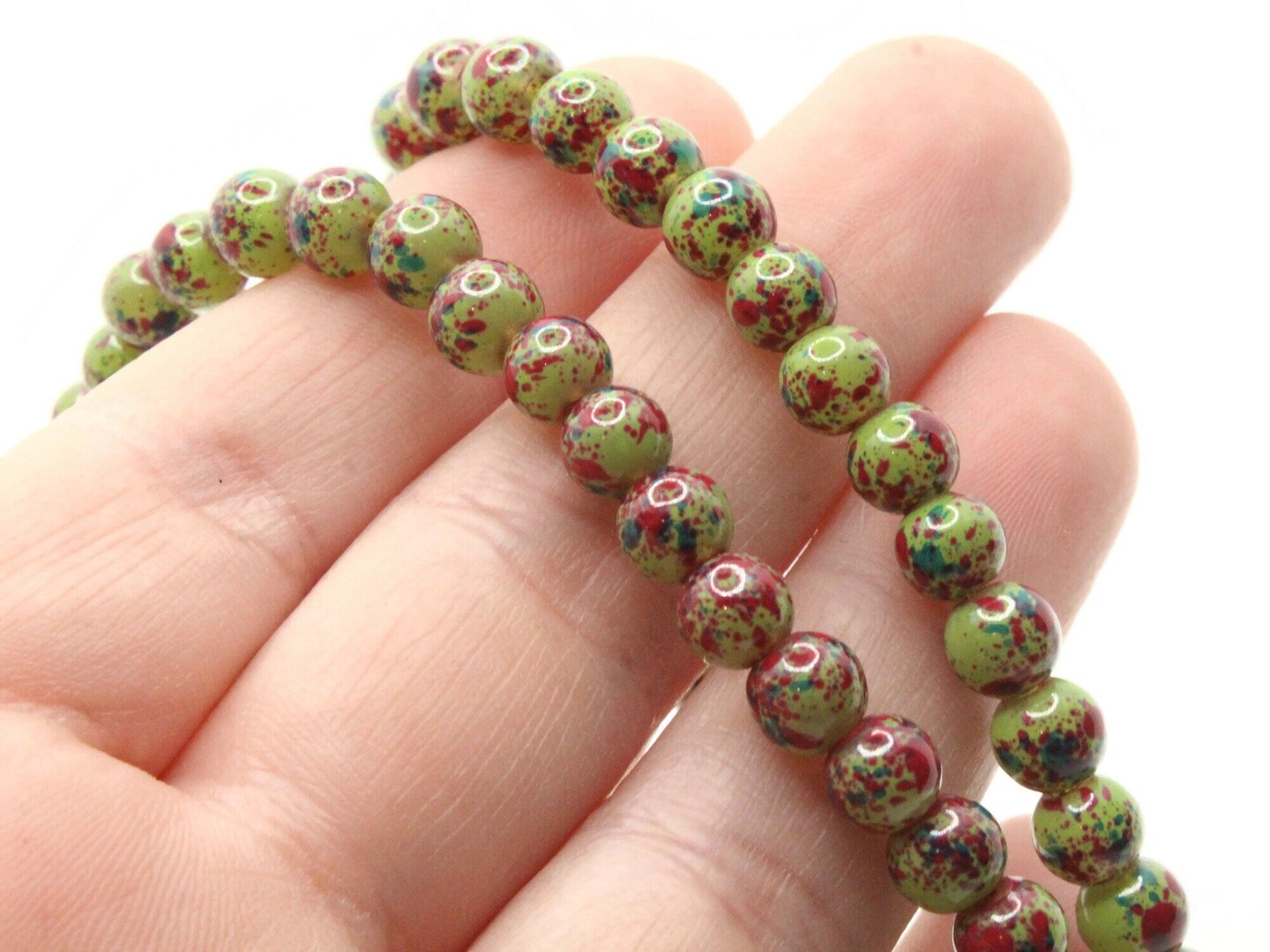 75 6mm Green and Red Splatter Paint Smooth Round Glass Beads