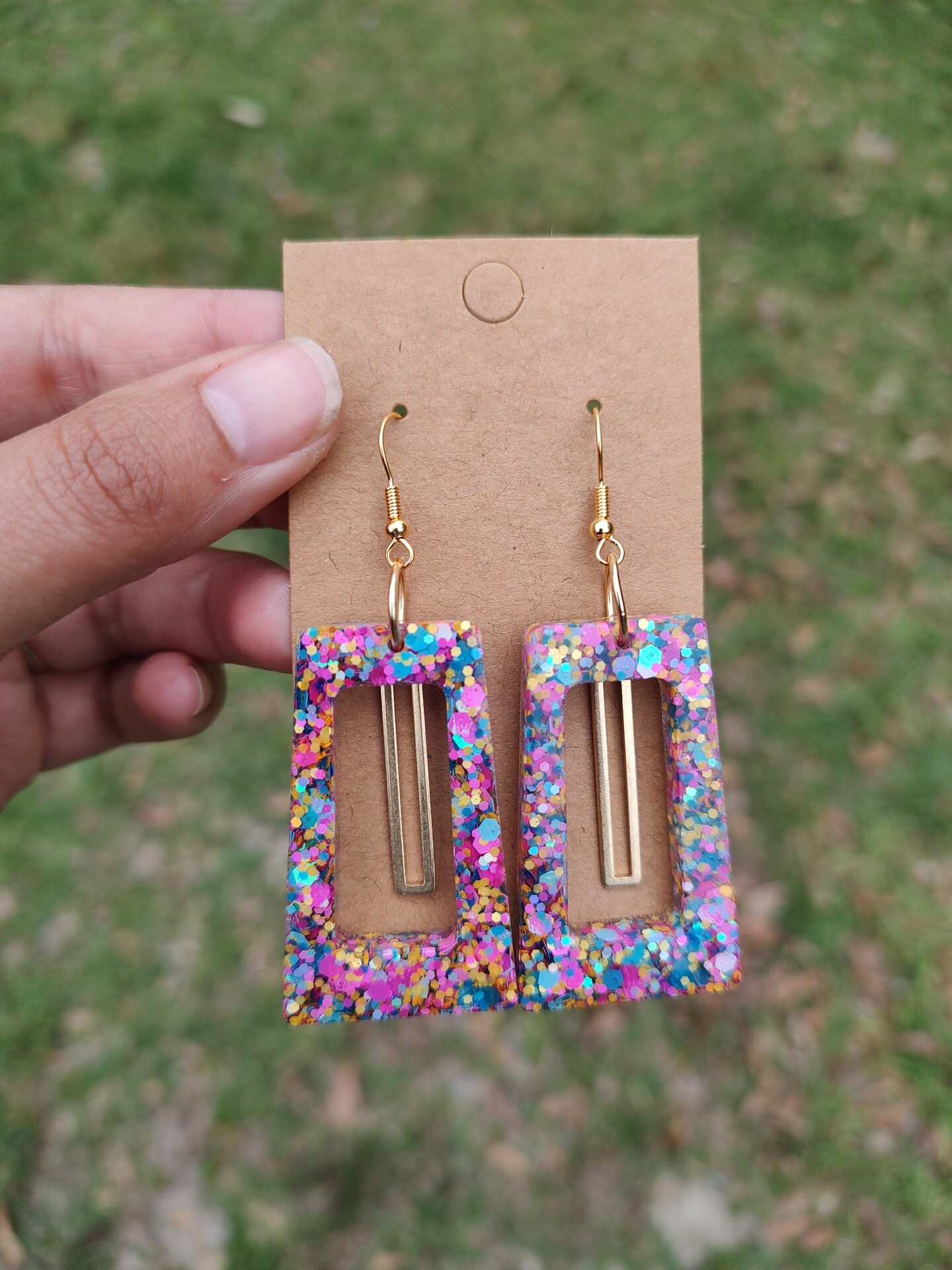 Multi-colored resin earrings.