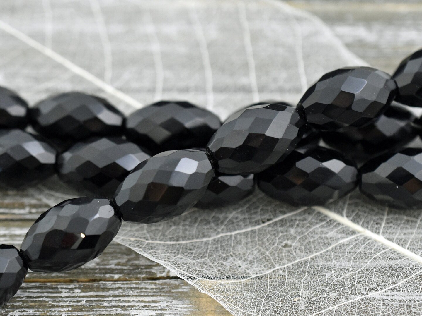 *6* 12x20mm Jet Black Faceted Oval Fire Polished Beads