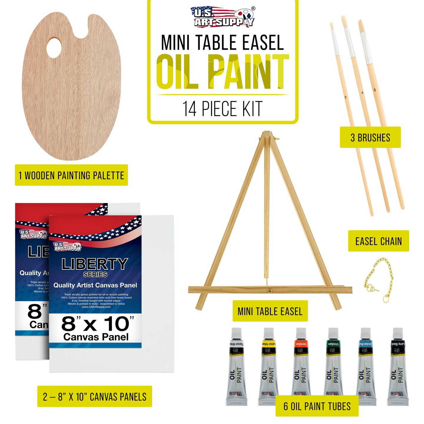 Artist paintbrushes, paint tubes and small easel with canvas