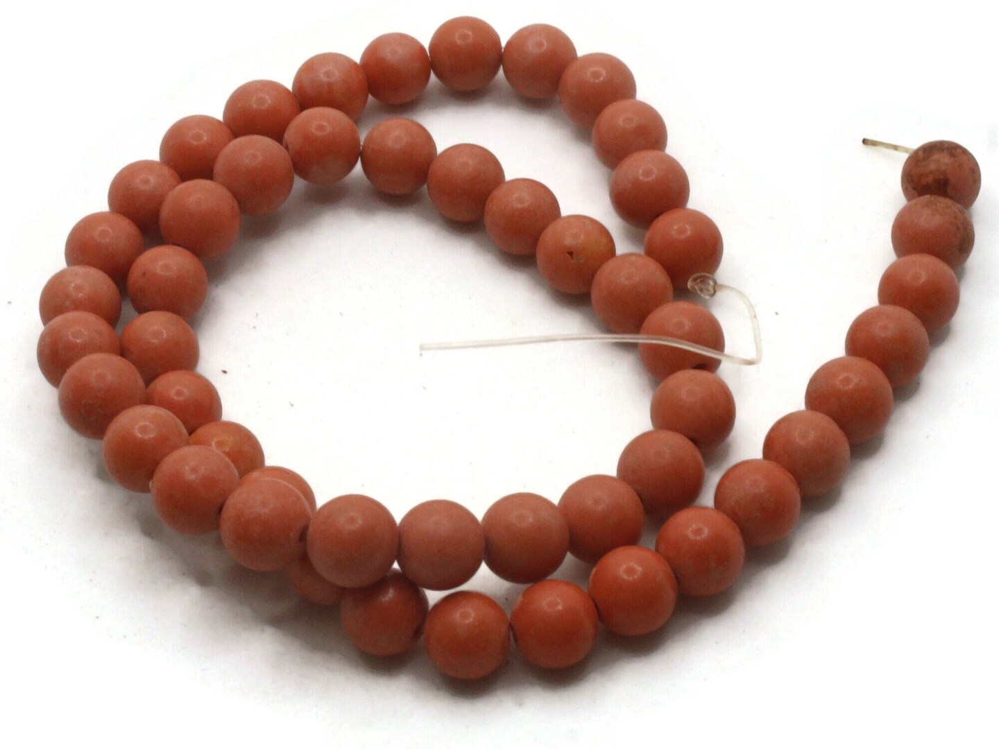 51 7mm to 8mm Round Dyed Orange Howlite Stone Beads