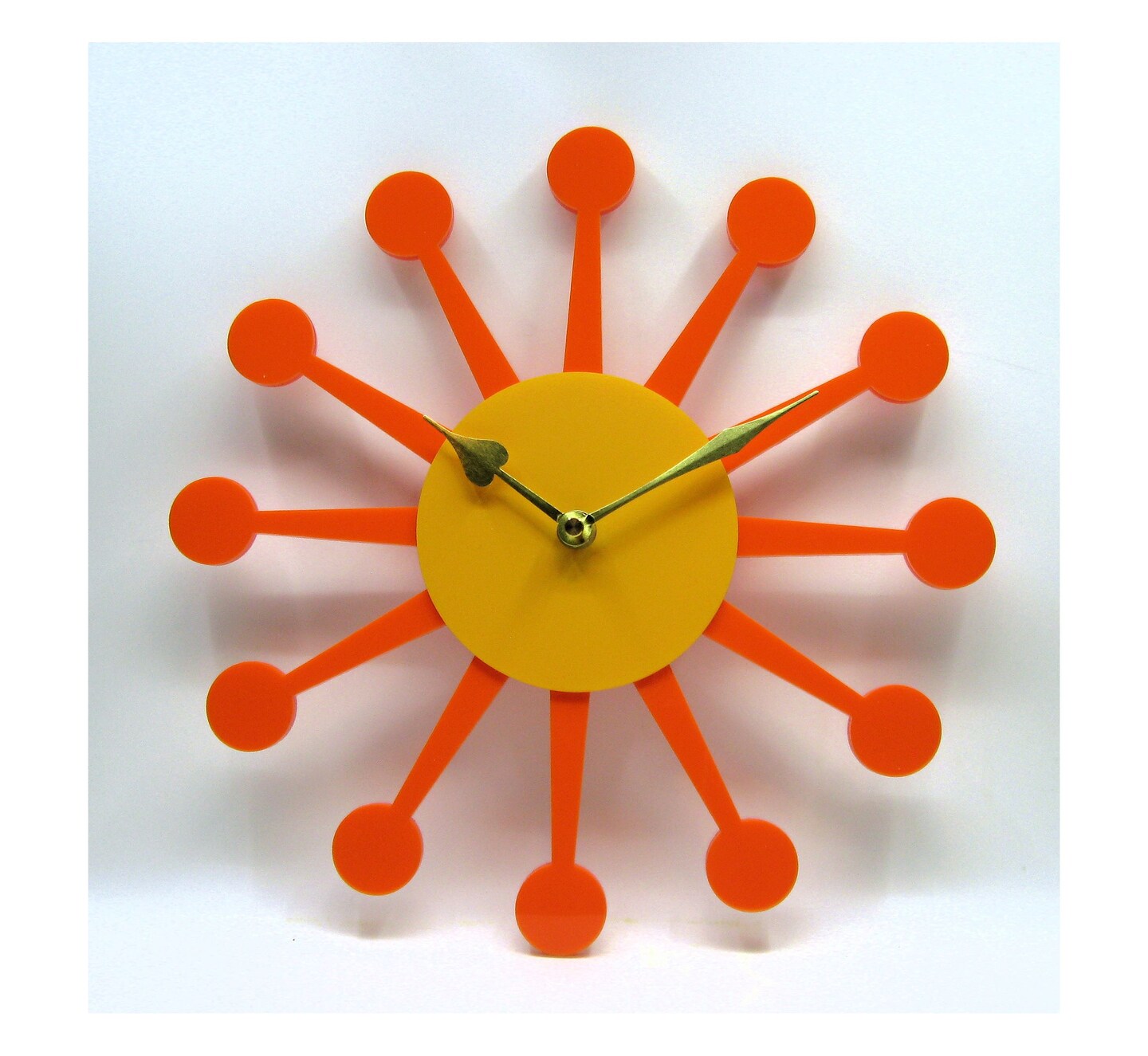 Atomic MCM Gold sunburst wall clock plastic Electric F G buy Ellerman Co Evanstan IL