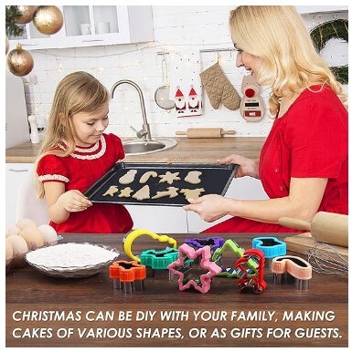 Christmas Cookie Cutters: 9 Christmas holiday themed baking cutters in the shapes of a flying deer, a snowflake, a Christmas tree, a deer head, Santa Claus, socks, crutches, a snowman, and a gingerbread man.