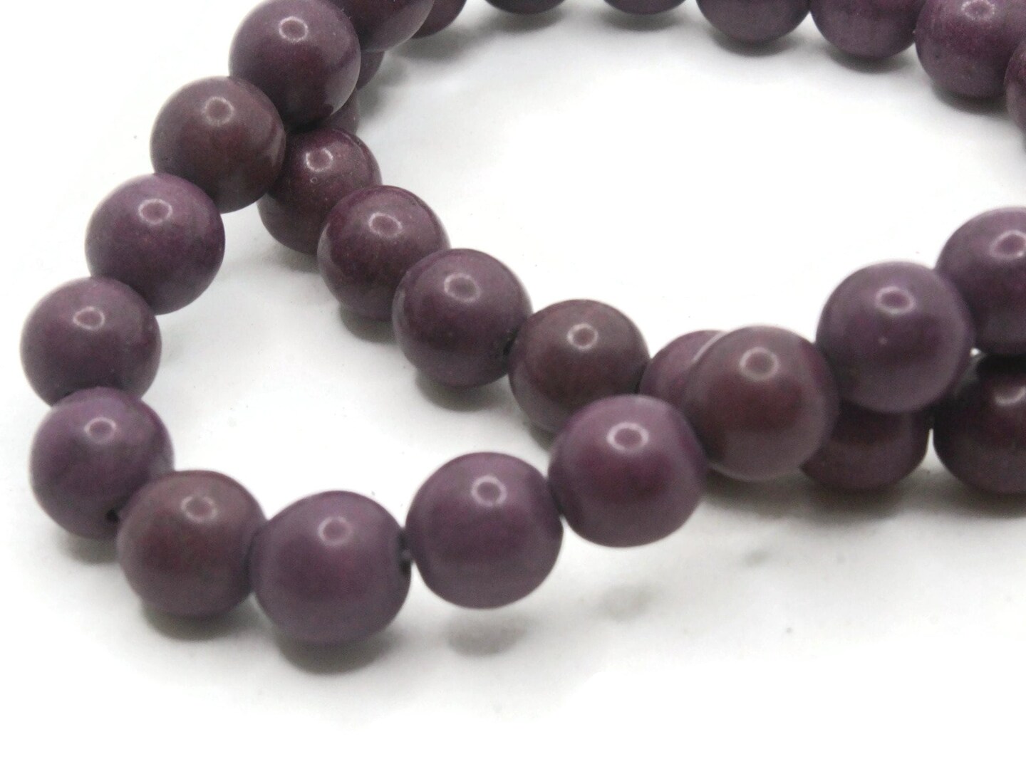 42 9mm to 10mm Round Dyed Purple Howlite Stone Beads