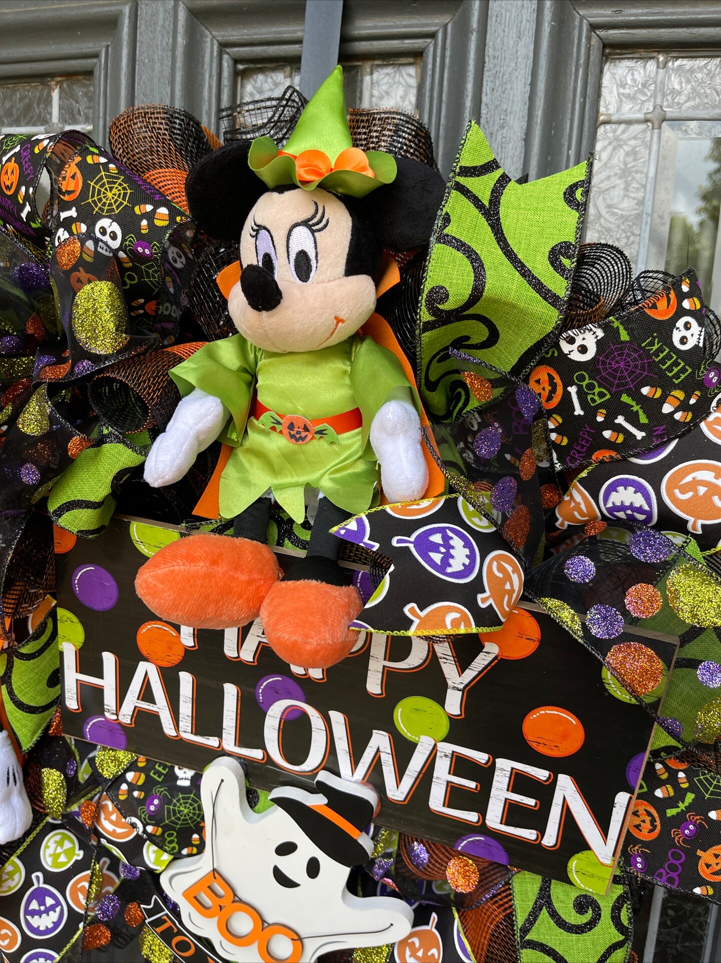 Store Halloween wreath with Mickey and Minnie plushes