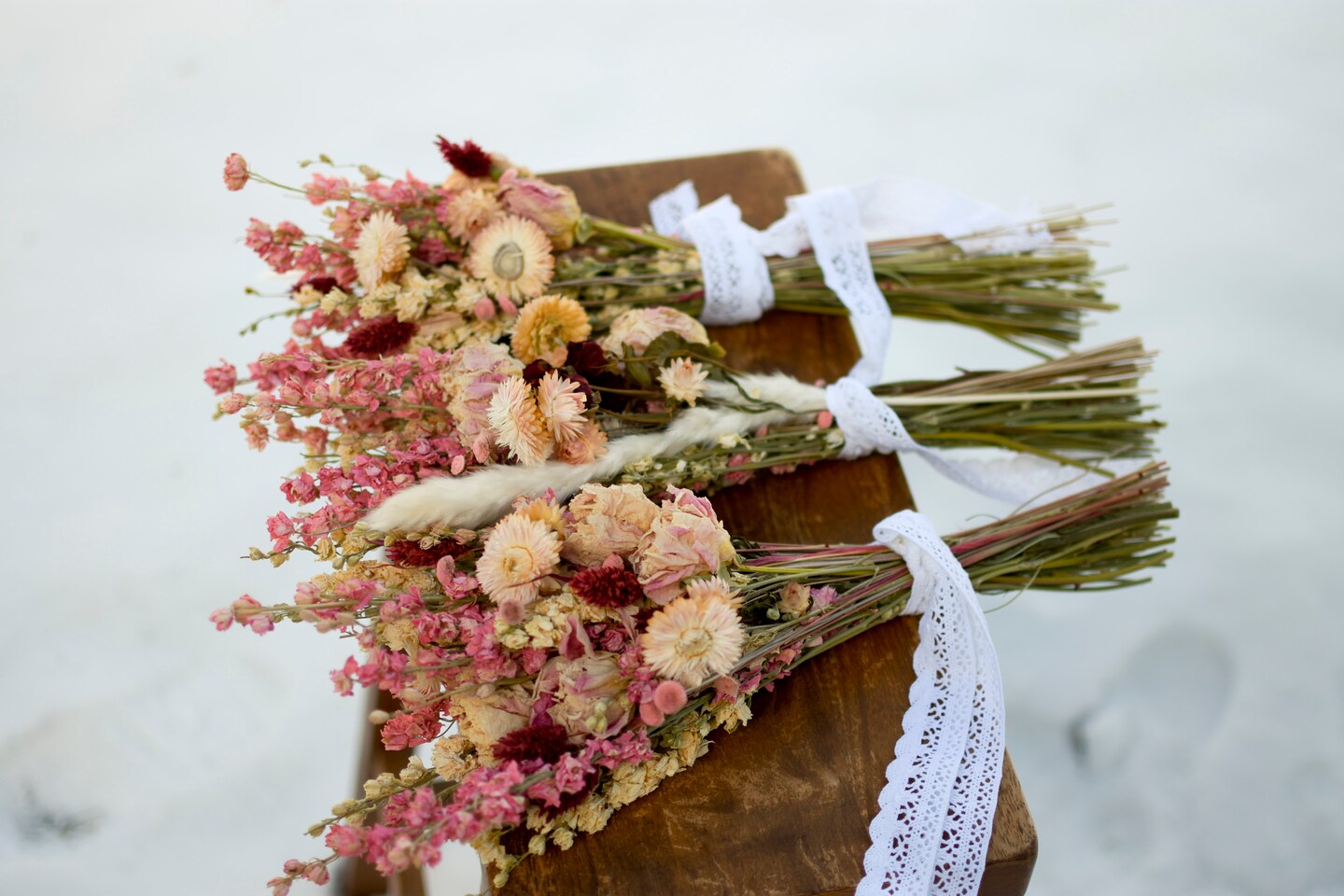 Pink and cream wildflower bouquet with peonies