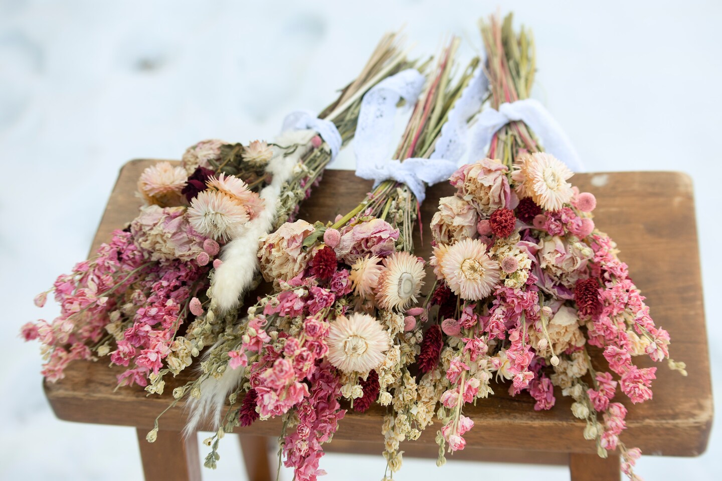 Pink and cream wildflower bouquet with peonies