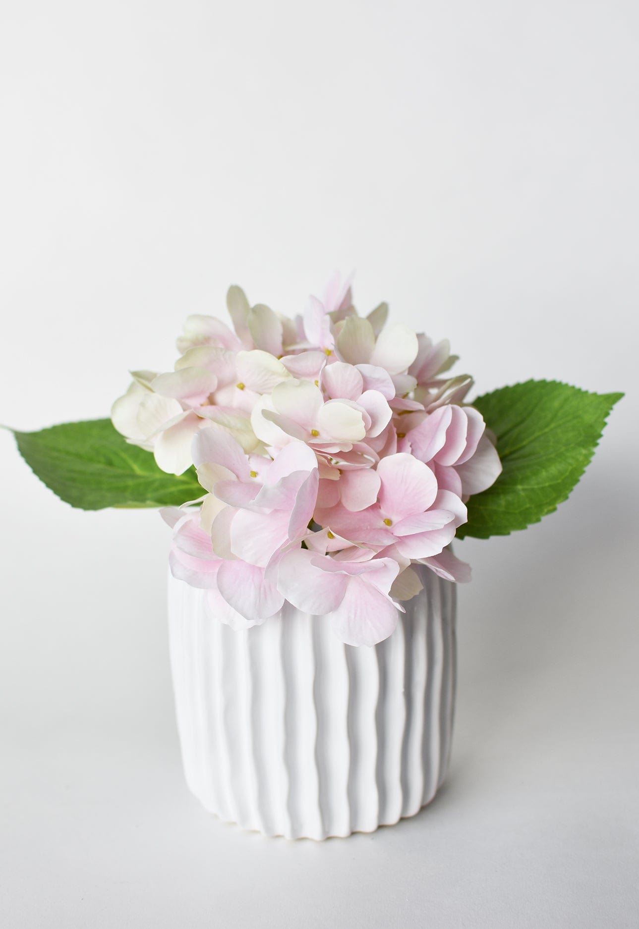 10&#x22; Faux Light Pink Hydrangea Stem