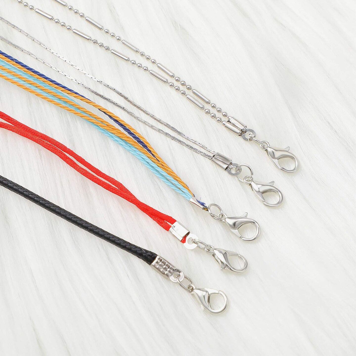 1000 Pieces Fold Over Cord Ends Cord Crimp End Tips Fold-Over End Caps Leather Ribbon Ending Clasp Tips Jewelry Connector for Jewelry Making, 3.5 x 9 mm/ 0.14 x 0.35 Inch, 5 Colors