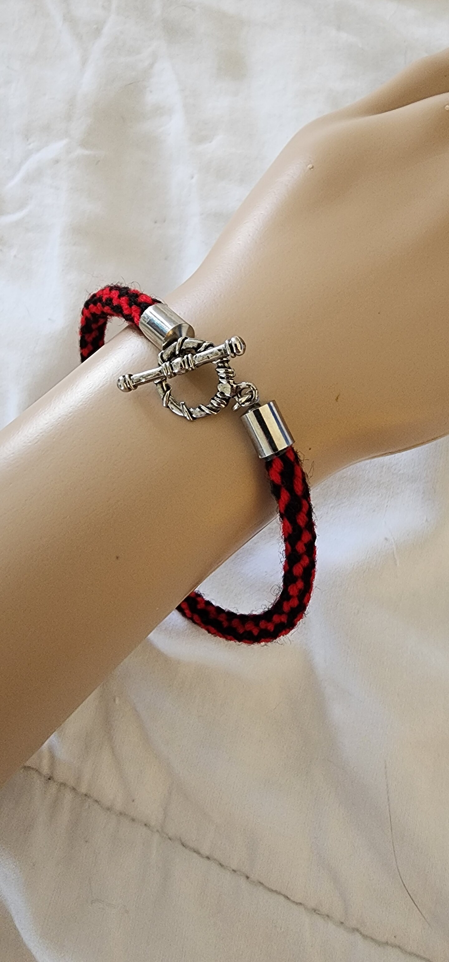 Kumihimo bracelet made from yarn | MakerPlace by Michaels