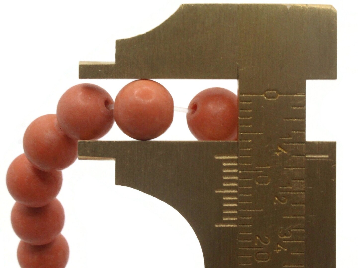 51 7mm to 8mm Round Dyed Orange Howlite Stone Beads