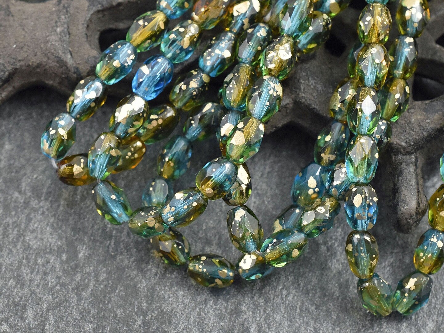 *20* 5x7mm Gold Washed Teal Topaz Fire Polished Faceted Oval Beads