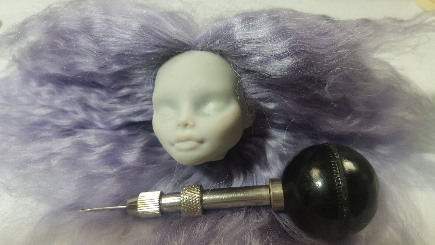 How to Reroot Doll Hair with Yarn image 2