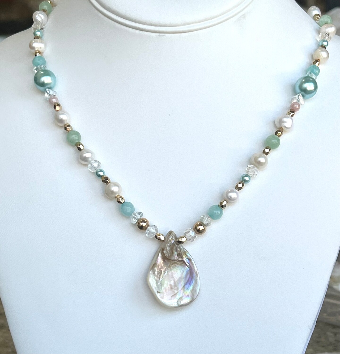 Pearl necklace with semi precious Sunstones, Abalone shell pendant