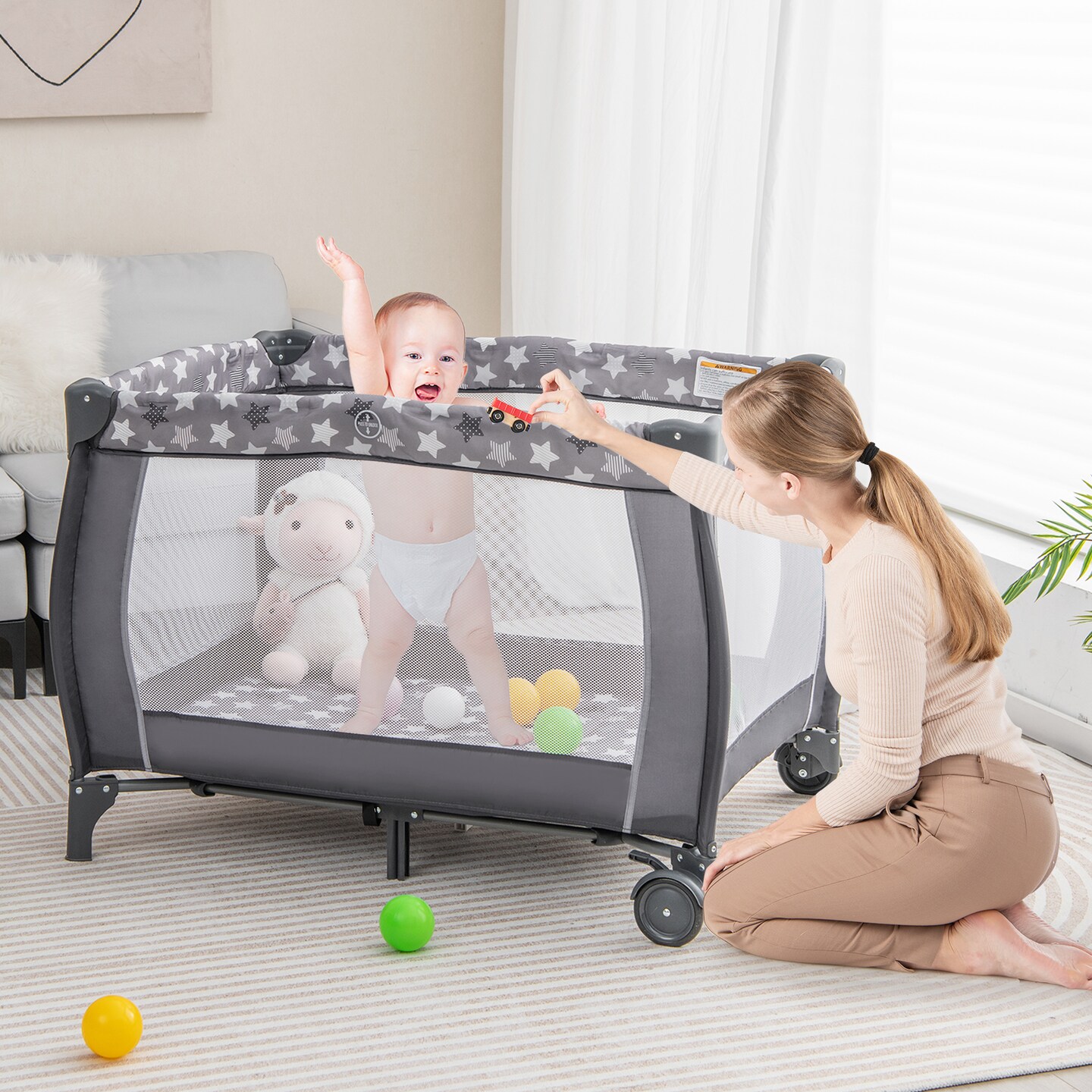 Portable Baby Playard with Changing Table Bassinet and Music Box