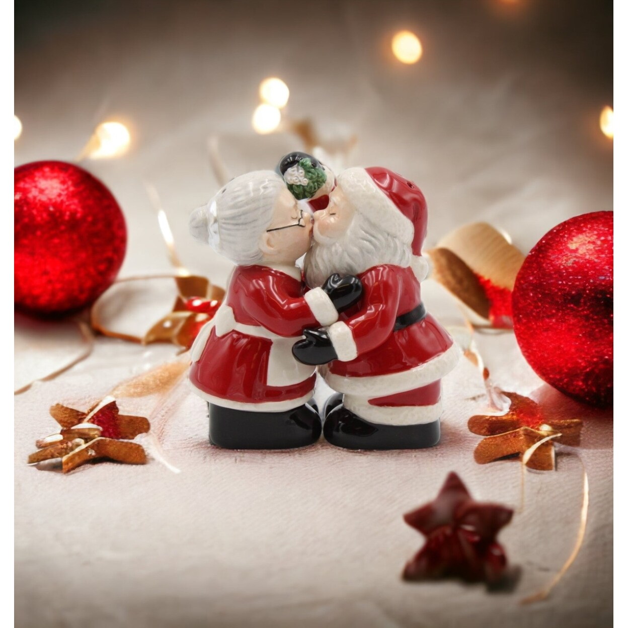 Ceramic Christmas Decor Kissing Santa and Mrs. Claus Salt And Pepper Shakers