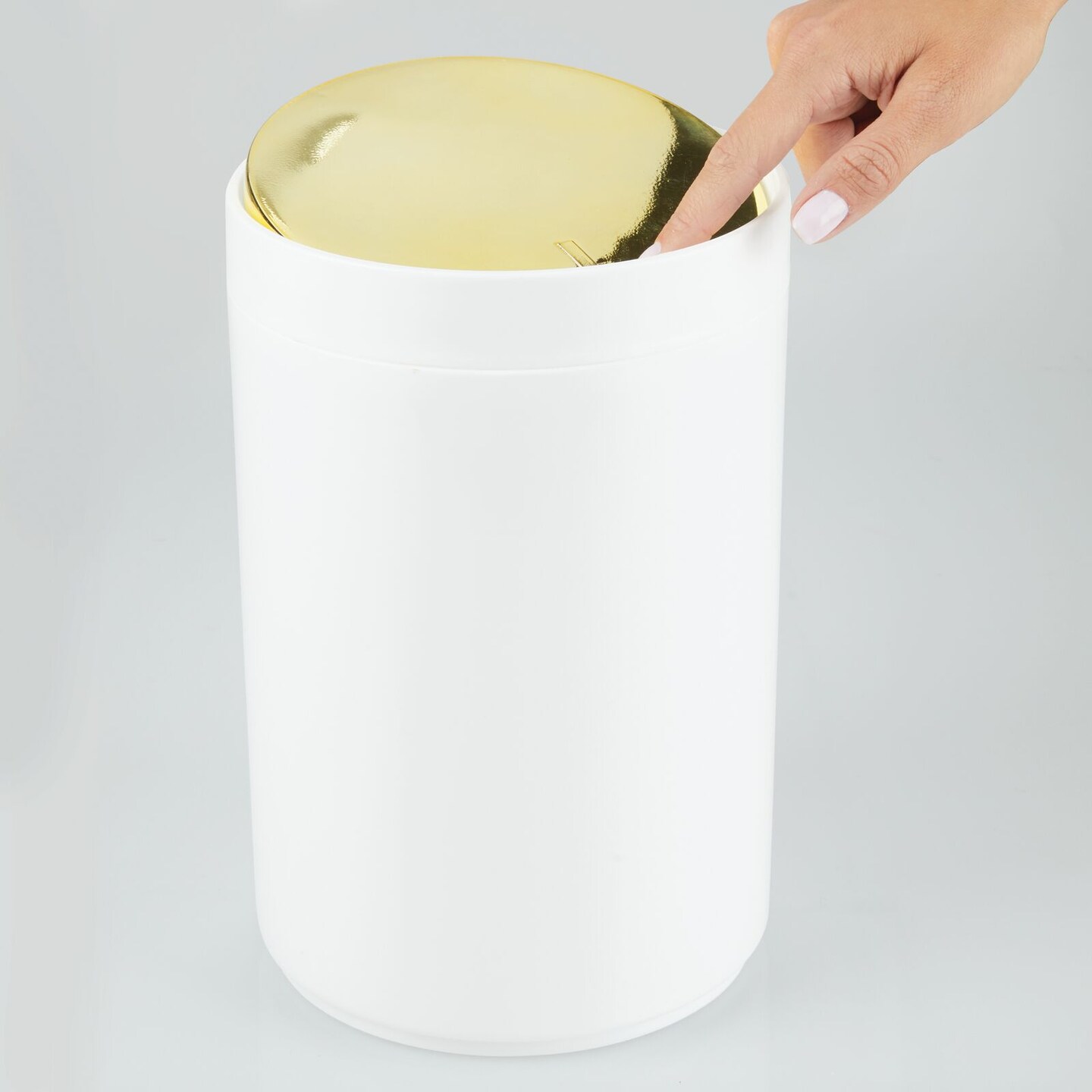 mDesign Plastic Small Round Trash Can Wastebasket, Swing Lid