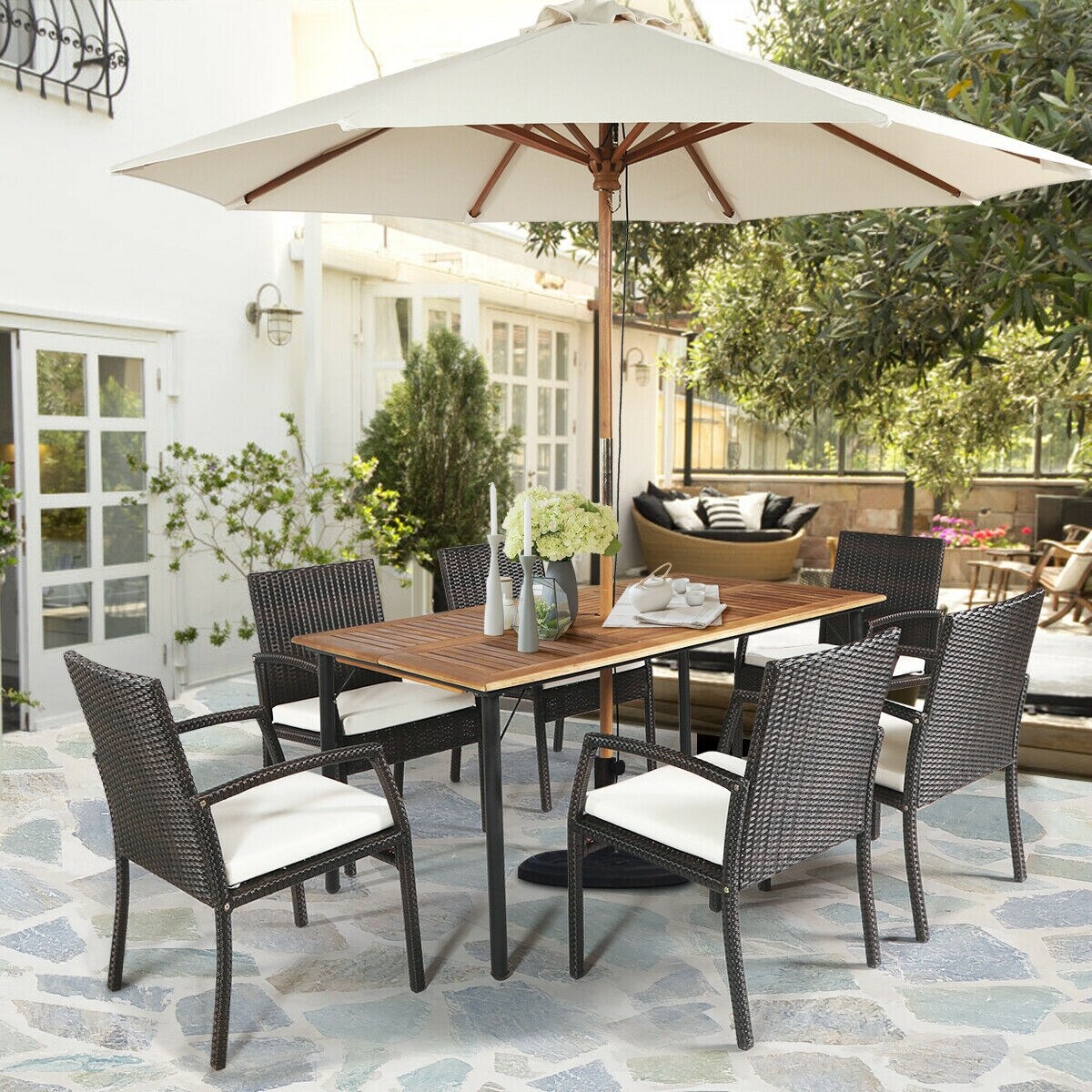 best patio dining set with umbrella Amazon's Prime Day Furniture Deals Are Up to $300 Off PHI VILLA Dining Set with elegant and classic black design brings unique aesthetic perception to patios Table Best Patio Swings 7-Piece