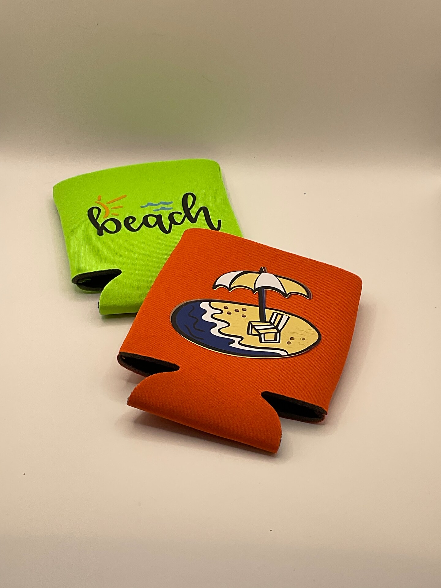 product name is Koozies, beverage Koozies