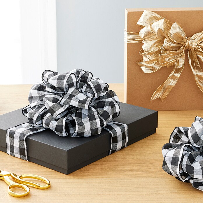 DIY Gift Wrapping: Master the Simple Black Bow – StyleCaster