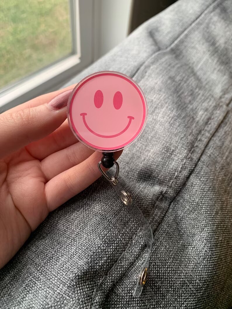 Accessories, Pink Smiley Face Badge Reel