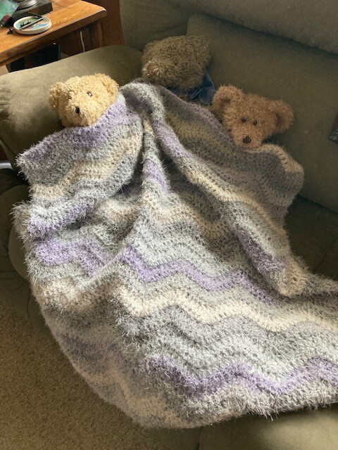 Warm handmade crocheted store baby blanket