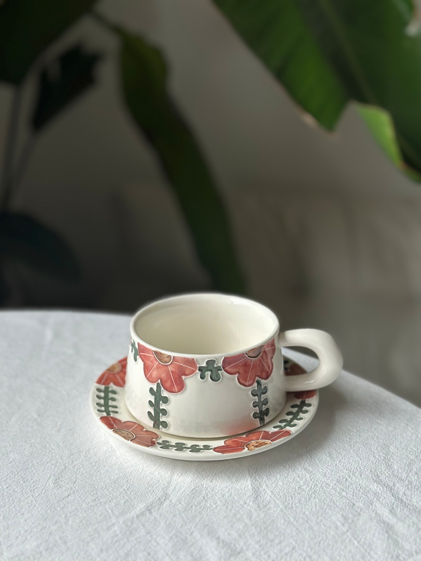 Handmade pottery coffee tea cup, mug with orange red, blue