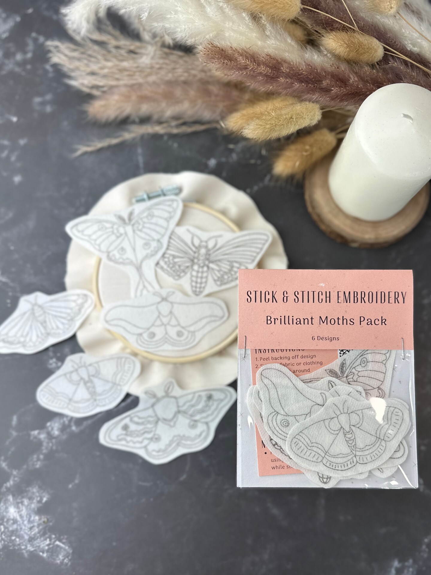 product name is Brilliant Moths Stick and Stitch - Pack of 6 - DIY Moth Embroidery - Dissolvable Embroidery Pattern - Moth Embroidery - Beginner Embroidery