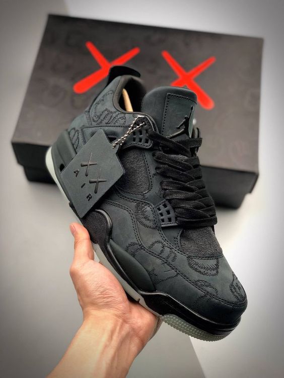 Jordan 4 kaws black on sale